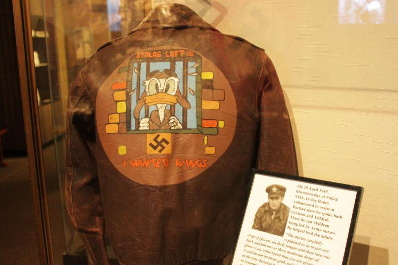 This A-2 jacket belonged to F/O Baum. The image of Donald Duck on his jacket served as the unofficial mascot for the POWs of Stalag Luft III after it was created by a fellow POW, 1st Lt. Emmet Cook of the 15th Air Force. It is currently on display at the National Museum of the Mighty Eighth Air Force.